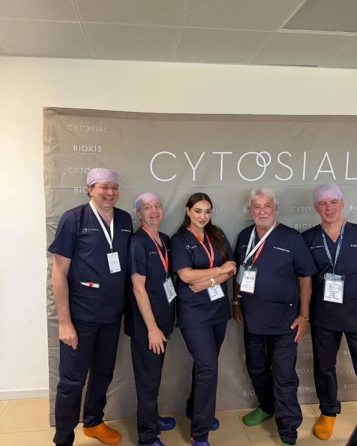 Faculty group photo at the Cytosial backdrop, Italy